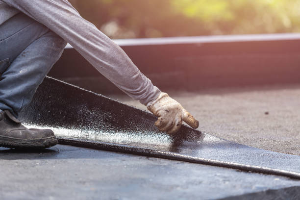 Professional Exterior Waterproofing technician working in Manchester, NY